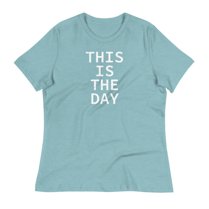 A mockup of the Humble Outlaw 'This is the Day Women's T-Shirt' in Heather Blue Lagoon color.